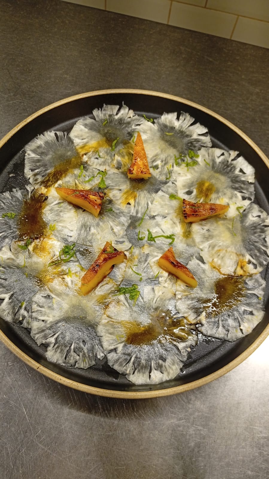Pineapple carpaccio with lime zest